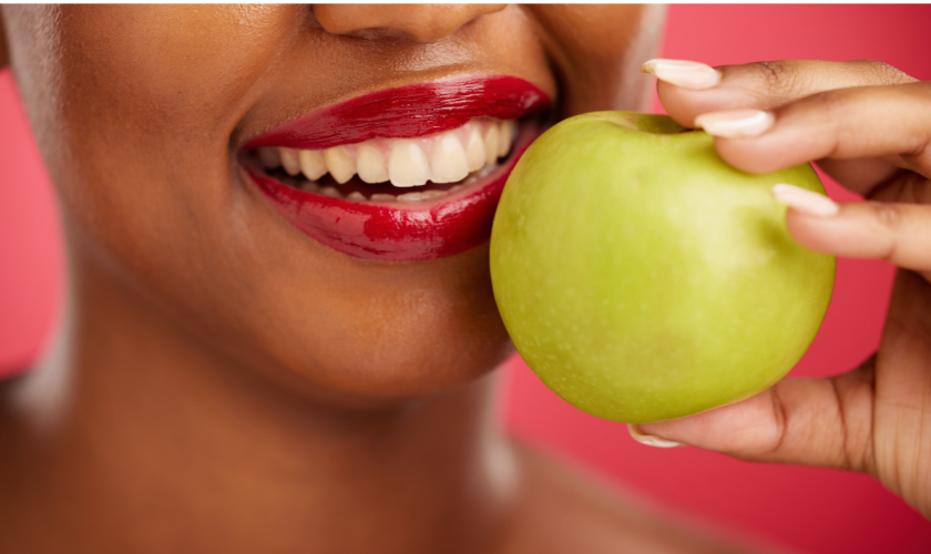 Smiling Newnan patient showing bright white teeth after whitening