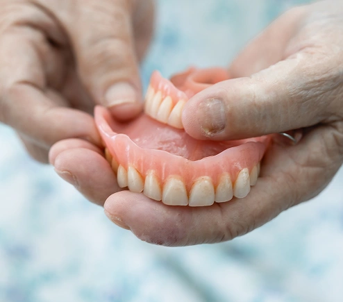 Dental implant placement at Bespoke Dental Newnan in Newnan, GA, restoring missing teeth with a strong, natural-looking solution.